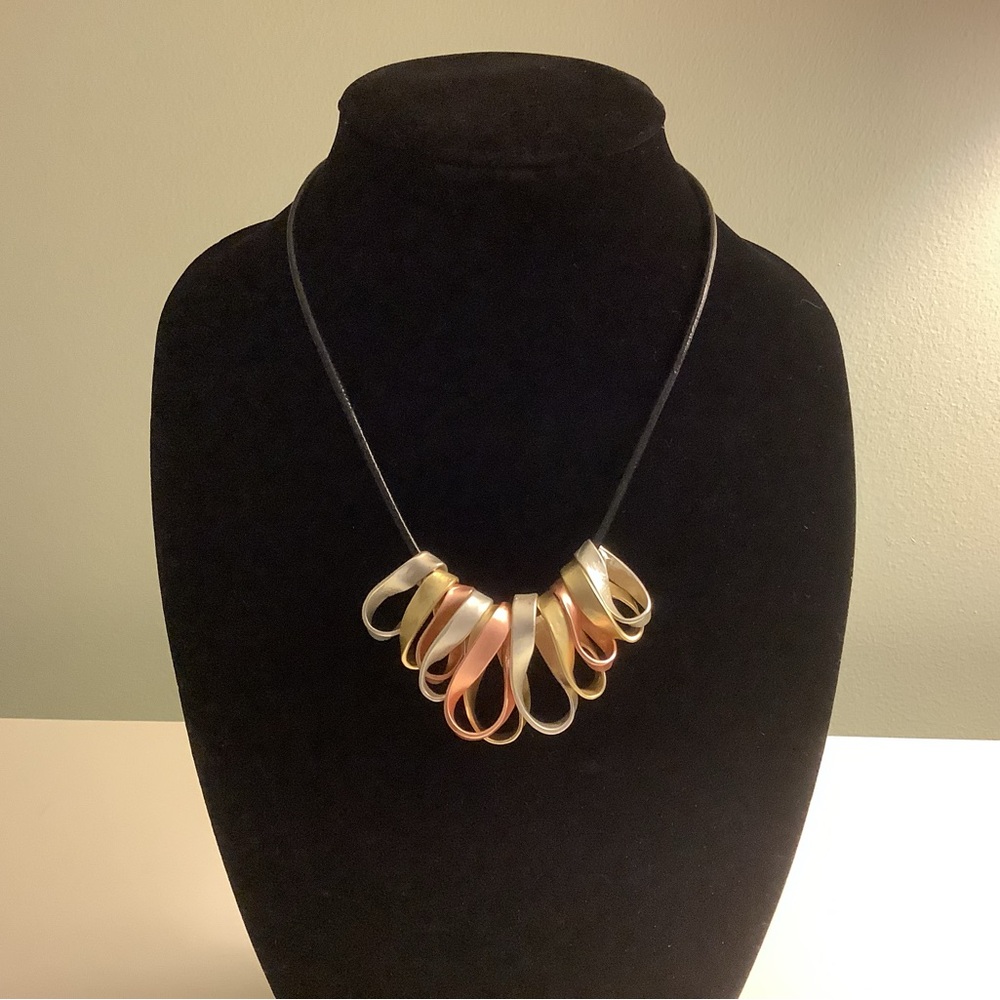 Mixed metal charm necklace